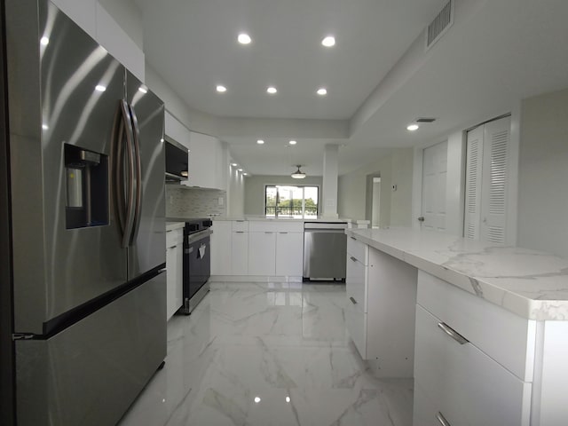 kitchen featuring white cabinets, recessed lighting, visible vents, modern cabinets, and appliances with stainless steel finishes