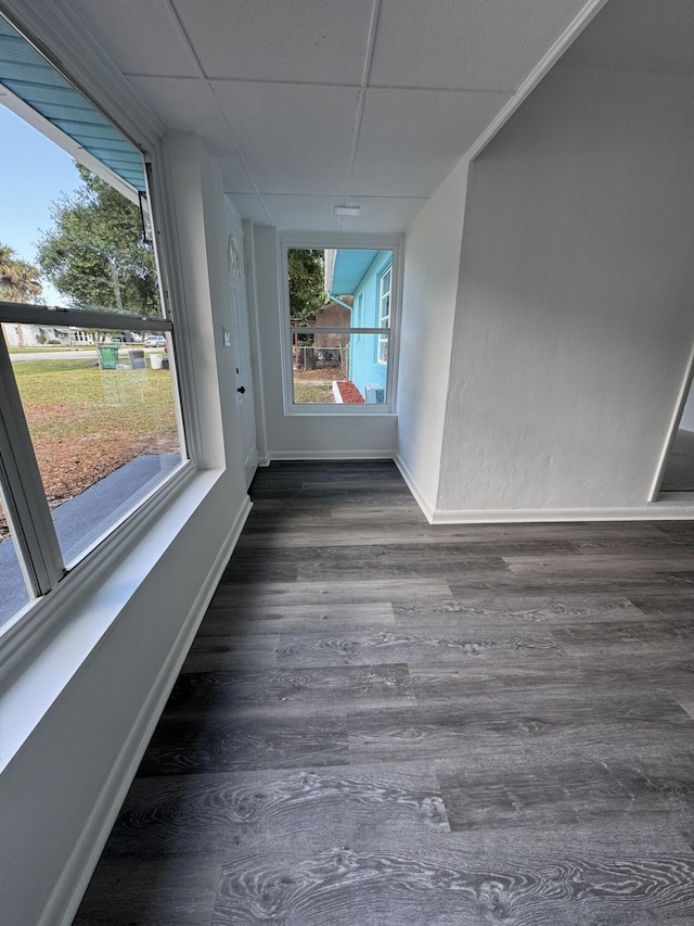 7507 Arthurs Rd, Fort Pierce, FL 34951 - unfurnished room with wood finished floors, baseboards, and a drop ceiling