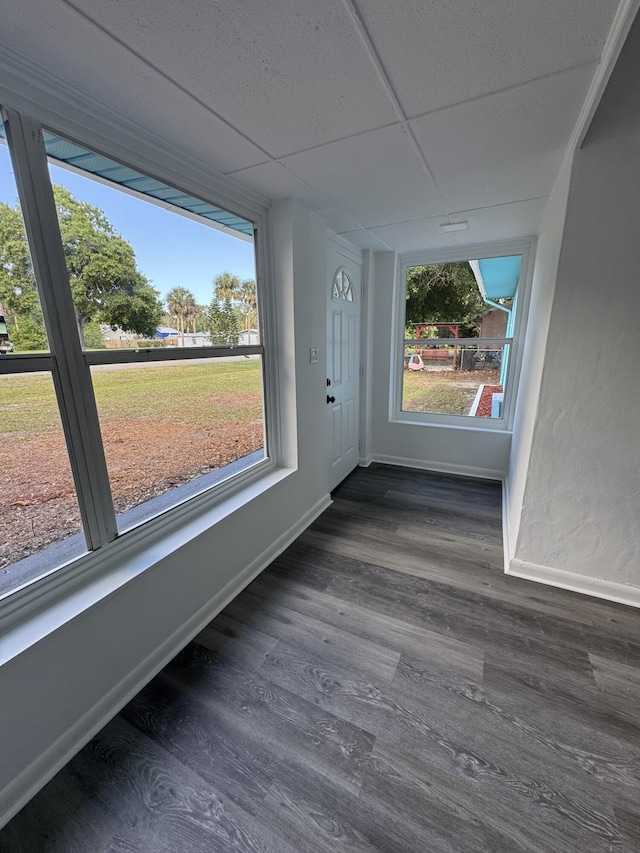 7507 Arthurs Rd, Fort Pierce, FL 34951 - interior space with baseboards, a paneled ceiling, and dark wood finished floors