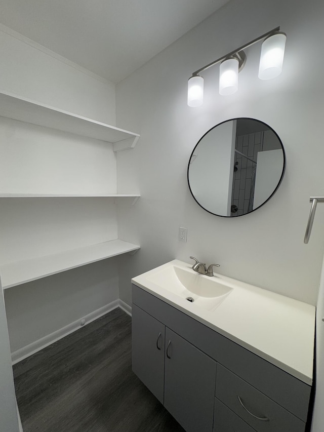 7507 Arthurs Rd, Fort Pierce, FL 34951 - bathroom with baseboards, vanity, and wood finished floors
