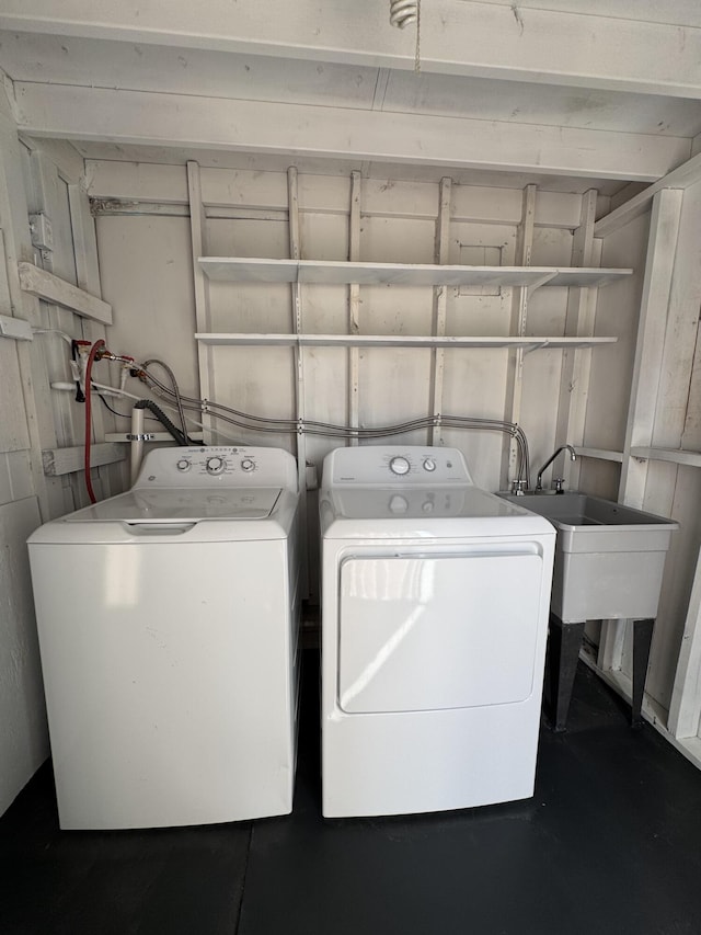 7507 Arthurs Rd, Fort Pierce, FL 34951 - laundry room featuring separate washer and dryer and laundry area
