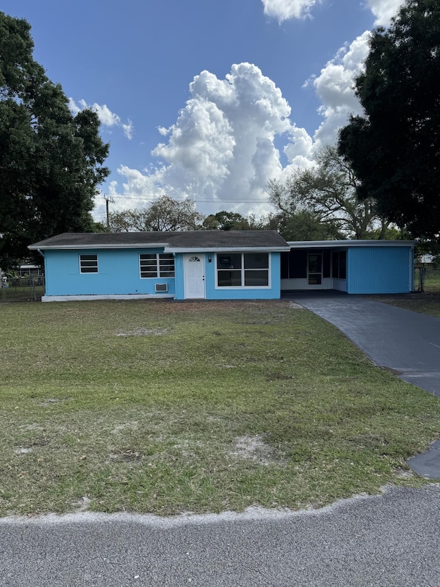7507 Arthurs Rd, Fort Pierce, FL 34951 - single story home with a front lawn and driveway