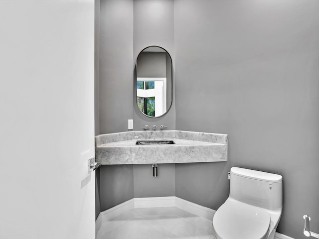 bathroom featuring toilet