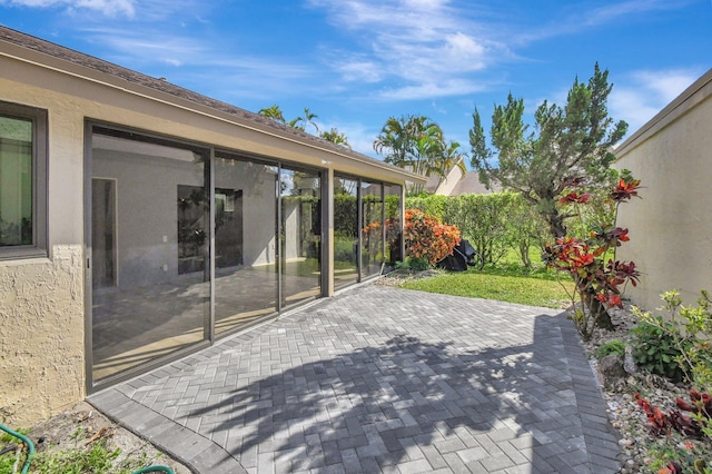 2430 NW 14th St, Delray Beach, FL 33445 - view of patio / terrace with a sunroom