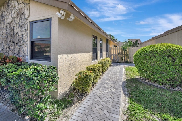 2430 NW 14th St, Delray Beach, FL 33445 - view of home's exterior with stucco siding