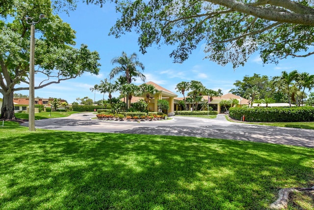 2430 NW 14th St, Delray Beach, FL 33445 - surrounding community with a yard