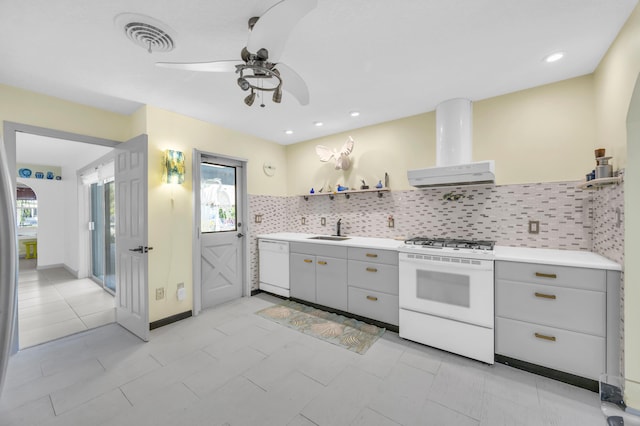 910 Dolphin Dr, Jupiter, FL 33458 - kitchen with visible vents, white appliances, a sink, island range hood, and gray cabinets