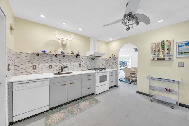 910 Dolphin Dr, Jupiter, FL 33458 - kitchen featuring white appliances, ceiling fan, a sink, open shelves, and wall chimney range hood