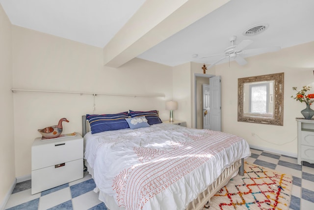 910 Dolphin Dr, Jupiter, FL 33458 - bedroom with visible vents, beamed ceiling, baseboards, tile patterned floors, and a ceiling fan