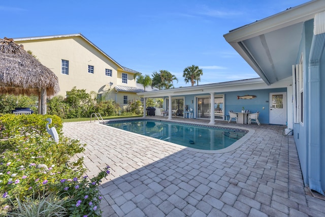 910 Dolphin Dr, Jupiter, FL 33458 - outdoor pool with a patio