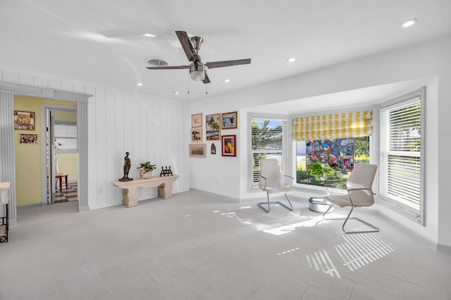 910 Dolphin Dr, Jupiter, FL 33458 - sitting room featuring visible vents, a healthy amount of sunlight, recessed lighting, and a ceiling fan