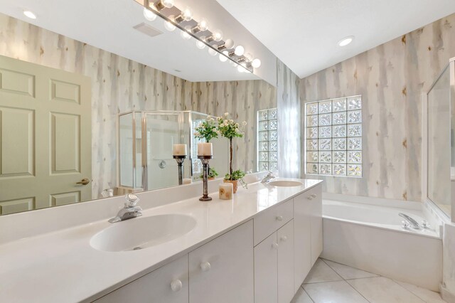 bathroom with tile patterned flooring, a sink, visible vents, and a shower stall