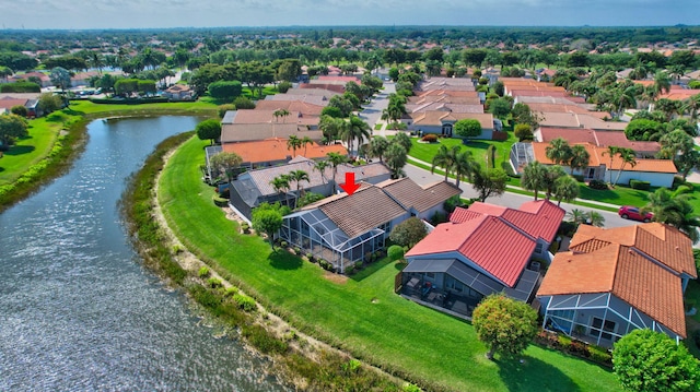aerial view featuring a water view and a residential view