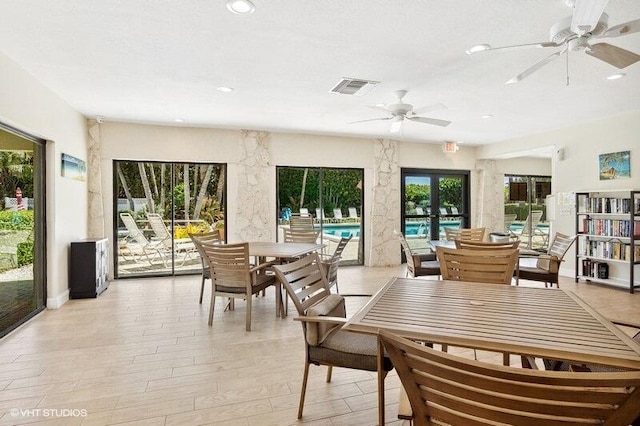 dining room with visible vents, light wood-style flooring, recessed lighting, and a ceiling fan