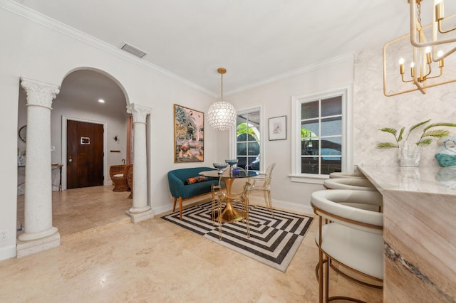 235 Nottingham Blvd, West Palm Beach, FL 33405 - dining area with ornate columns, a chandelier, crown molding, arched walkways, and baseboards