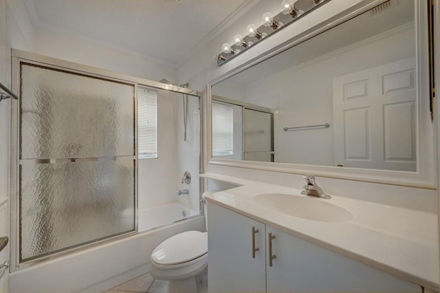 full bath featuring bath / shower combo with glass door, ornamental molding, toilet, vanity, and tile patterned flooring