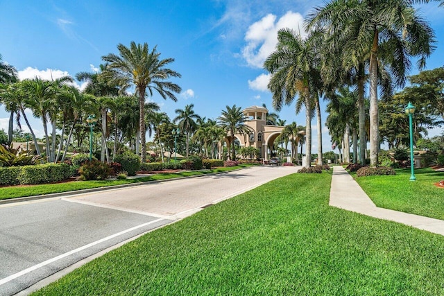 surrounding community with a yard
