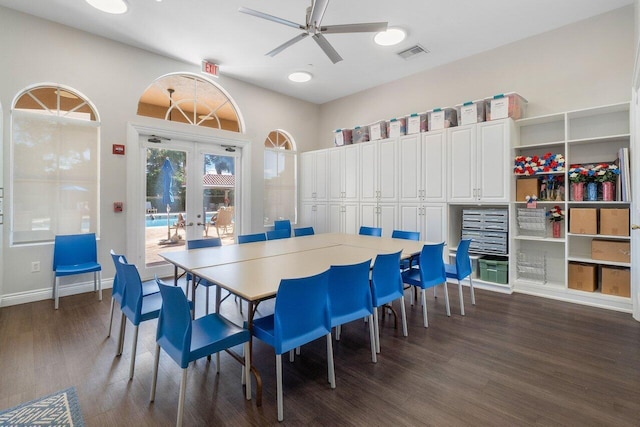 dining area featuring visible vents, baseboards, a ceiling fan, dark wood finished floors, and french doors