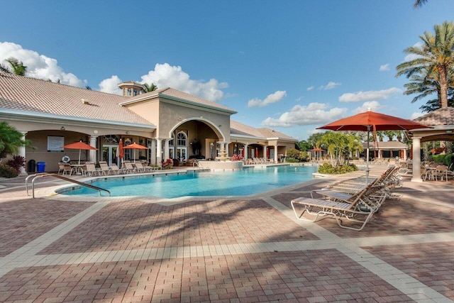 pool featuring a patio area