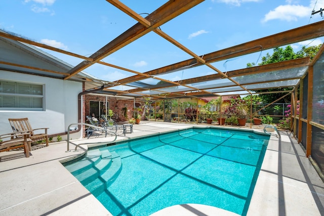 1330 SW 27th Pl, Boynton Beach, FL 33426 - outdoor pool featuring a patio and a lanai