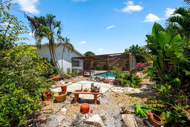 1330 SW 27th Pl, Boynton Beach, FL 33426 - view of patio / terrace with a lanai and an outdoor pool