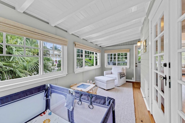 sunroom / solarium with french doors and beam ceiling