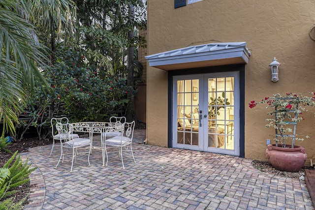 view of patio / terrace with french doors and outdoor dining area