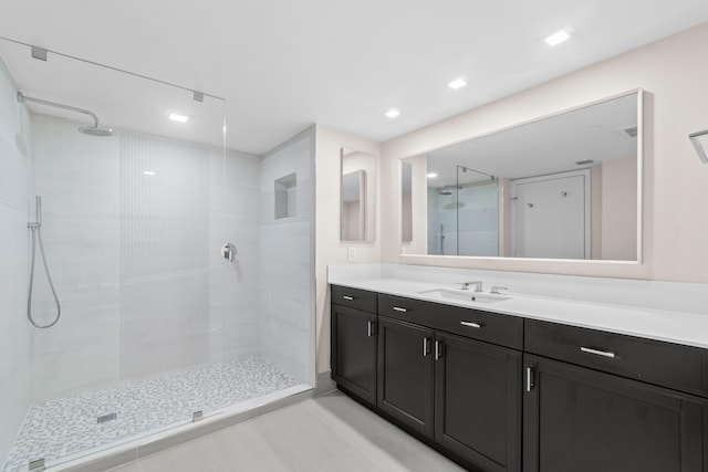 4001 N Ocean Blvd Unit 1602, Boca Raton, FL 33431 - bathroom with vanity, a walk in shower, tile patterned flooring, and recessed lighting
