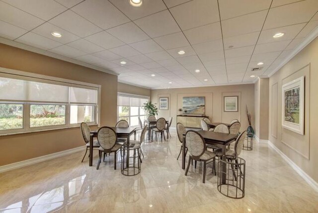4001 N Ocean Blvd Unit 1602, Boca Raton, FL 33431 - dining room with baseboards, crown molding, recessed lighting, and light marble finish floors