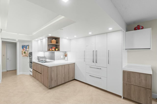 4001 N Ocean Blvd Unit 1602, Boca Raton, FL 33431 - kitchen featuring open shelves, modern cabinets, recessed lighting, light countertops, and double oven