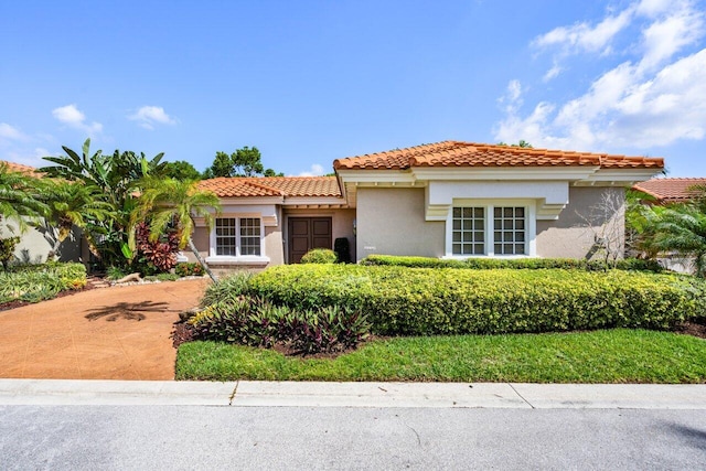 6349 NW 23rd St, Boca Raton, FL 33434 - mediterranean / spanish house featuring stucco siding and a tile roof