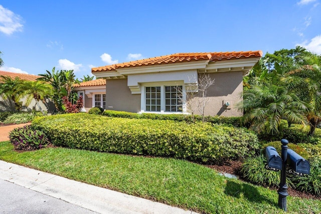 6349 NW 23rd St, Boca Raton, FL 33434 - view of front of home featuring stucco siding and a tile roof