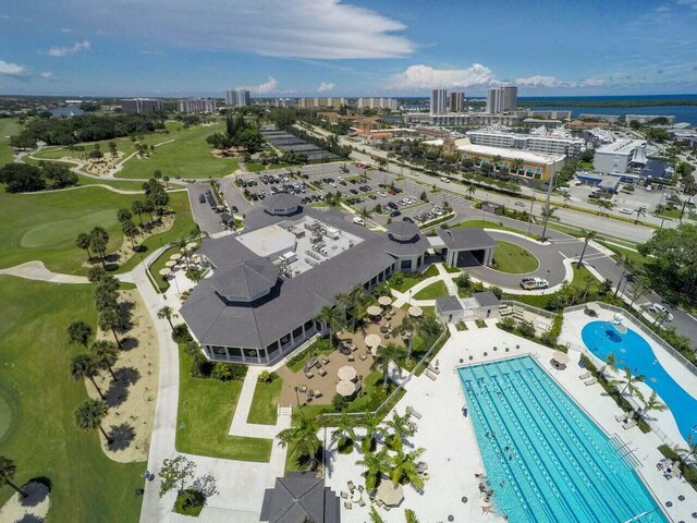 birds eye view of property with a city view