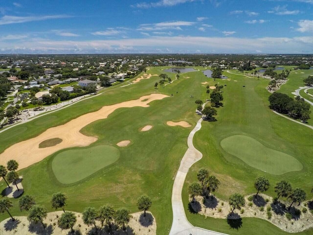 bird's eye view with a residential view, a water view, and golf course view