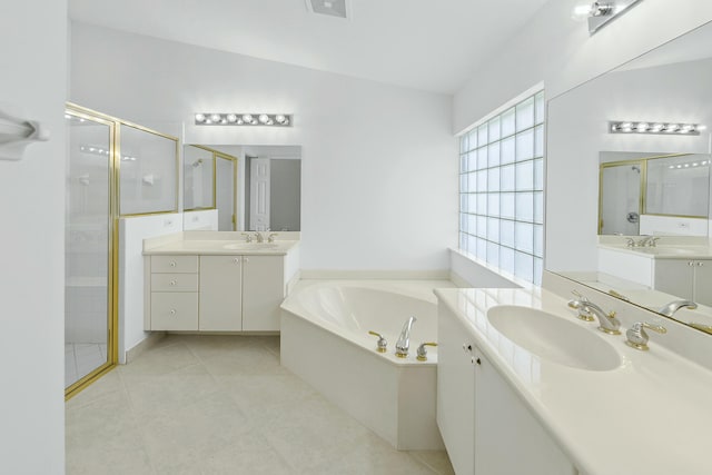 7130 Catania Dr, Boynton Beach, FL 33472 - bathroom featuring tile patterned floors, a sink, a stall shower, and a bath