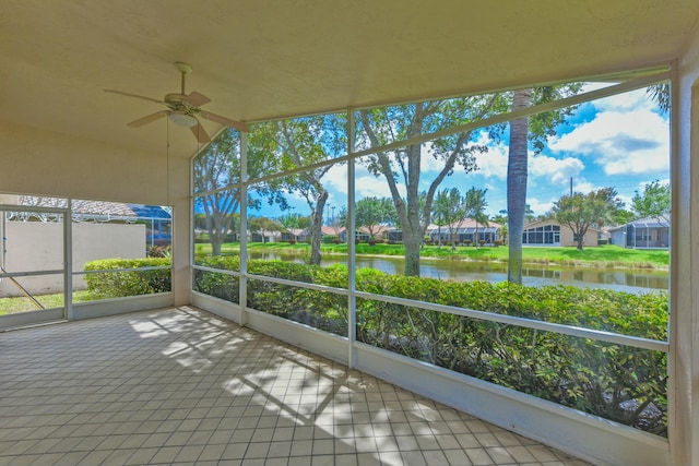 7130 Catania Dr, Boynton Beach, FL 33472 - unfurnished sunroom featuring a ceiling fan, a water view, and a residential view