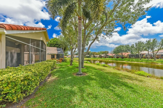 7130 Catania Dr, Boynton Beach, FL 33472 - view of yard featuring a water view and a sunroom