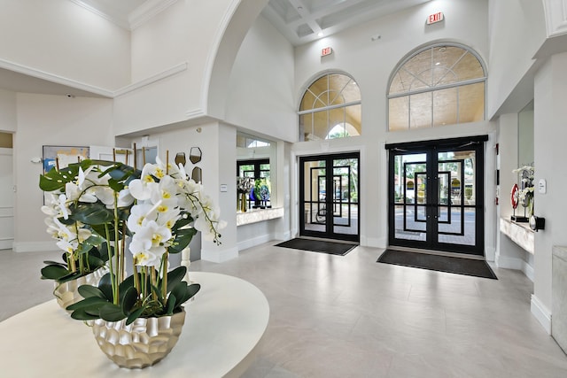 7130 Catania Dr, Boynton Beach, FL 33472 - entryway featuring a wealth of natural light, a high ceiling, and french doors
