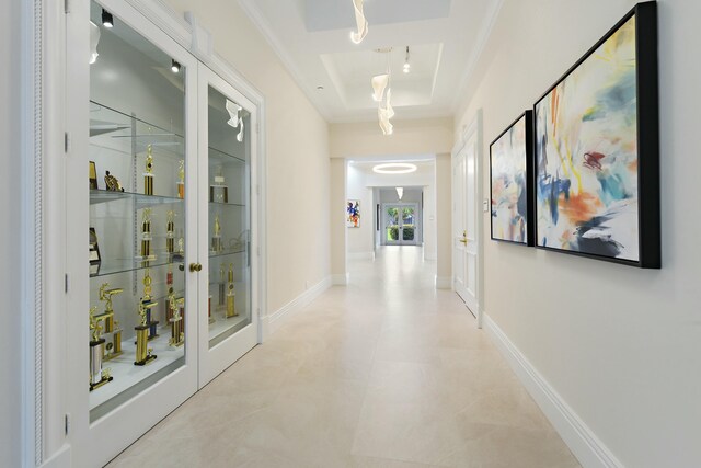 7130 Catania Dr, Boynton Beach, FL 33472 - corridor with baseboards and crown molding