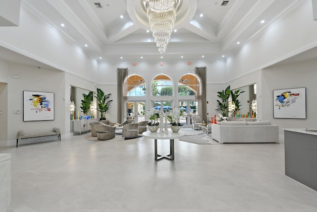 7130 Catania Dr, Boynton Beach, FL 33472 - living area with a high ceiling, an inviting chandelier, and crown molding