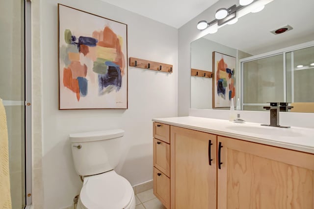 full bathroom with vanity, toilet, tile patterned floors, and a shower stall