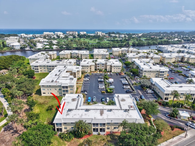 bird's eye view with a water view