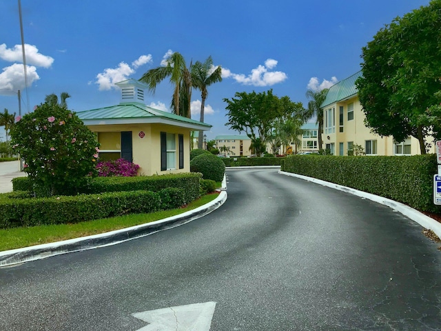 view of street with curbs