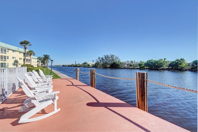view of dock with a water view