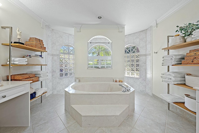 bathroom with ornamental molding, a textured ceiling, walk in shower, a garden tub, and tile patterned flooring