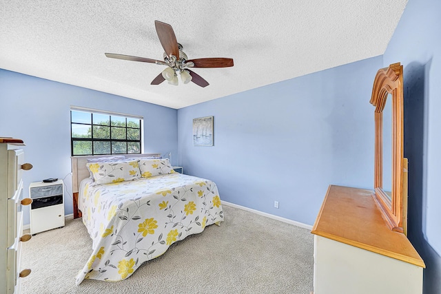 3050 Norwood Pl Unit N208, Boca Raton, FL 33431 - bedroom with baseboards, carpet flooring, a textured ceiling, and a ceiling fan