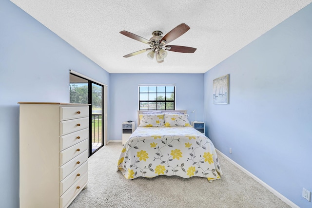 3050 Norwood Pl Unit N208, Boca Raton, FL 33431 - bedroom featuring baseboards, ceiling fan, carpet, and a textured ceiling