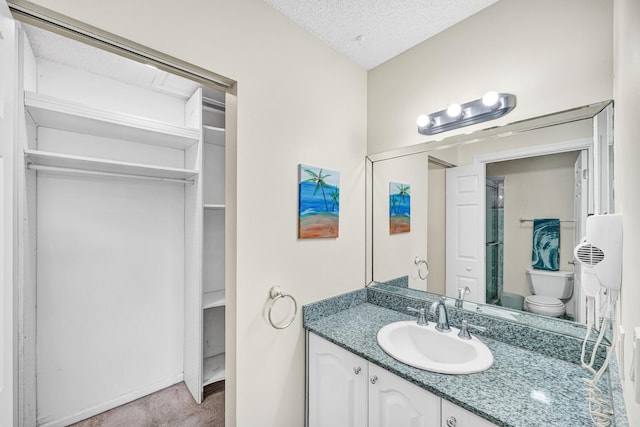 3050 Norwood Pl Unit N208, Boca Raton, FL 33431 - full bath with toilet, walk in shower, vanity, and a textured ceiling