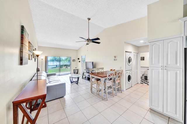 3050 Norwood Pl Unit N208, Boca Raton, FL 33431 - dining space featuring light tile patterned floors, stacked washer / drying machine, a textured ceiling, and ceiling fan