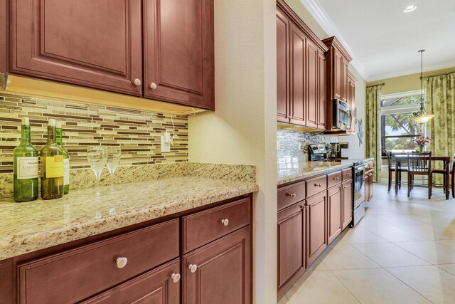 16988 SW Ambrose Way, Port Saint Lucie, FL 34986 - kitchen with crown molding, pendant lighting, tasteful backsplash, light stone counters, and stainless steel appliances